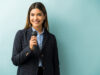 Pretty Businesswoman Giving Speech In Studio